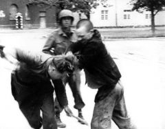 Nazi Guard Beaten By freed prisoner