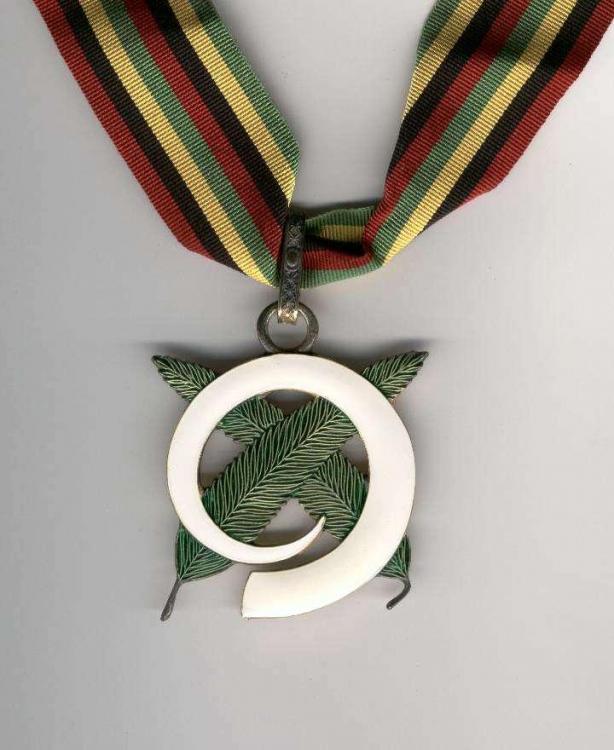 Vanuatu Badge of Honour to Bishop of Noumea 2007.jpg