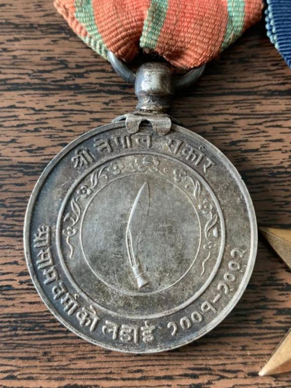 Nepal Assam Burma War Medal obverse close up.JPG