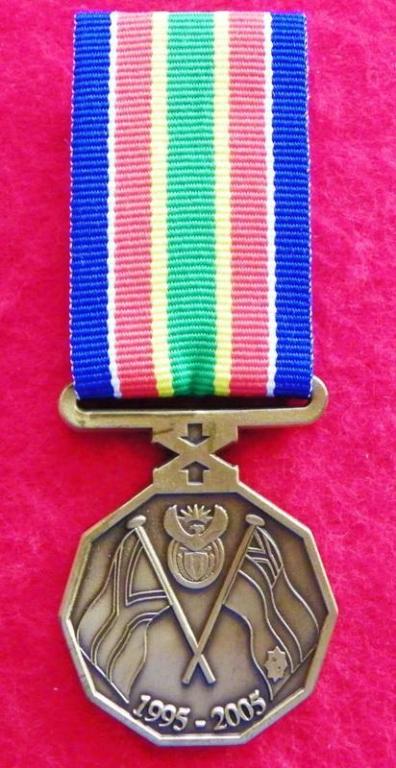 SA Police Service Ten Year Commemoration Medal (1 st Ribbon) (Open Suspender) (1).JPG