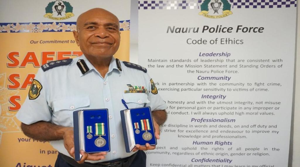 Nauru Fijian Police Inspector Sakiusa Tikotani Presnted with Nauru Medal for Outstanding Performance & Nauru Police Force International Law Enforcement Parnership Mdal in 2021.jpg